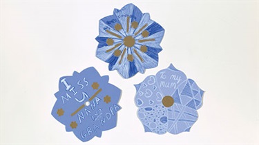 Image credit: A group of paper flowers decorated as part of Vipoo Srivilasa’s APT10 Kids project, Garden of Love 2021 Commissioned for APT10 Kids with support from the Tim Fairfax Family Foundation.  Image courtesy of QAGOMA