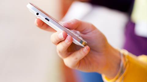 Hand and mobile phone