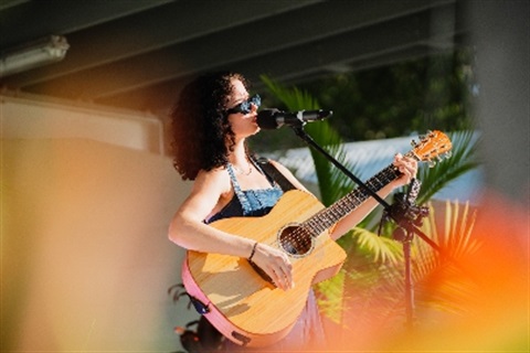 Lady playing guitar