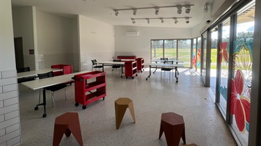 Park Studio setup with stools, tables and chairs.