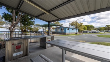 Bongaree Caravan Park covered barbecue seating area