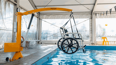 Indoor heated program swimming pool hoist