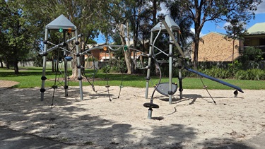 Playground with slide and climbing structures