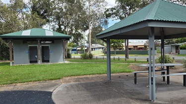 Sheltered picnic table and toilet block