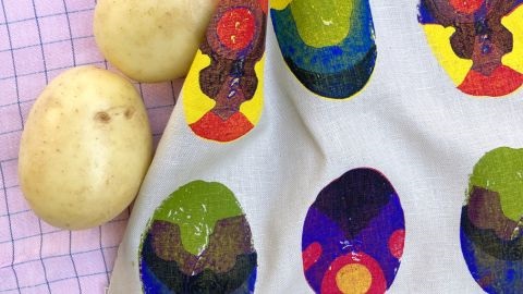 Two potatoes and coloured potato printing example