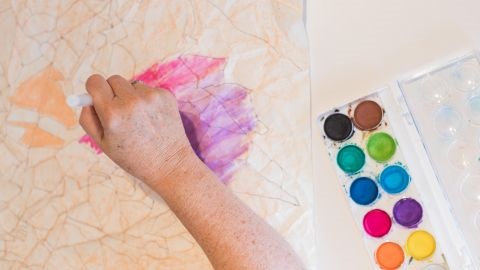 Hand painting with paint palette