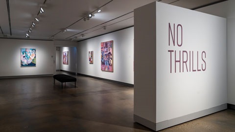 Image of art hanging on gallery walls