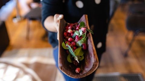 Traditional bowl filled with lillypilly berries