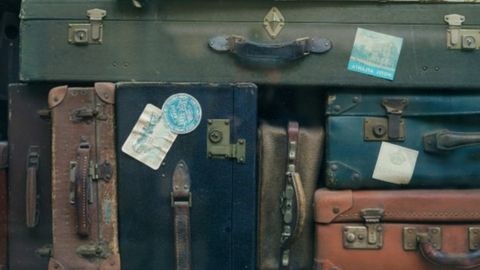 A stack of old suitcases