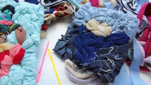 Scrap material woven into shapes