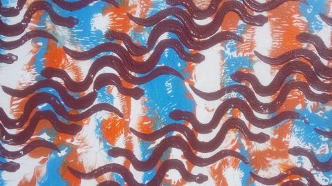 Indigenous print with brown snake lines