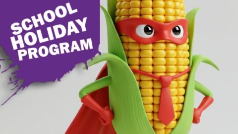 Corn cob with superhero cape and glasses