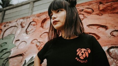 Woman in black t-shirt with transfer sticker