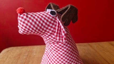 Red gingham check reindeer ornament