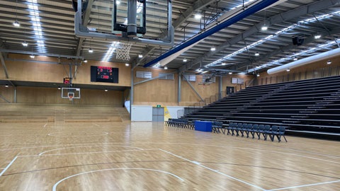 Image of Basketball court with the granstand in the background