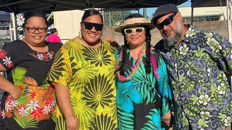 Image of 4 people wearing Polynesian clothing
