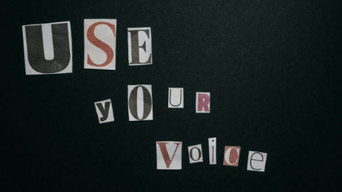 a black background with cut out pieces of a magazine creating words