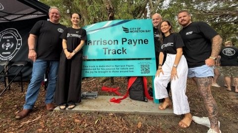 (L-R) City of Moreton Bay Mayor Peter Flannery, Kylie Payne, Kent Payne, Councillor Brooke Savige and Councillor Mark Booth at the official opening of Harrison Payne Track on Sunday, November 16, 2025.