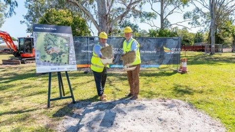 Mayor Peter Flannery and Councillor Jim Moloney celebrate the start of construction of a new park at Lawnton.jpg