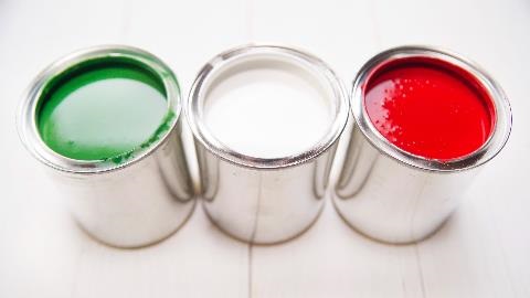 Three tins of paint.