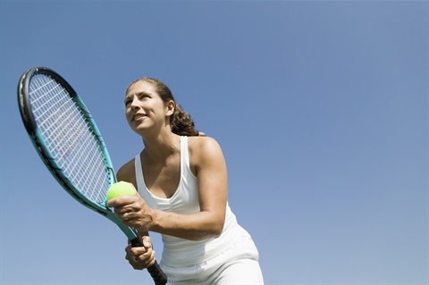 Person playing tennis