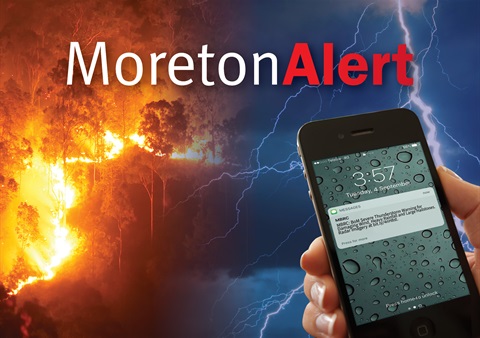 Image of mobile phone with storm alert message.