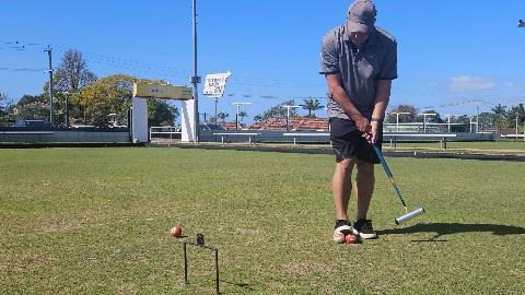 A person playing gateball.
