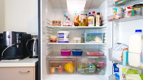 Open fridge showing food correctly stored inside