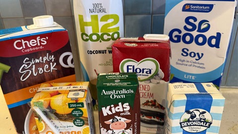 Several examples of Tetra Paks for milk, stock and other products