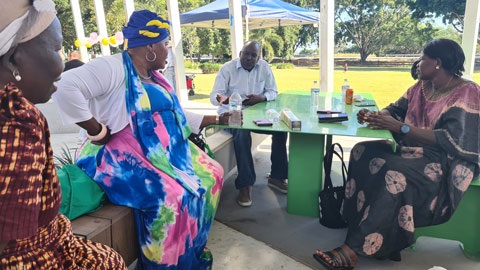 People talking around a table.