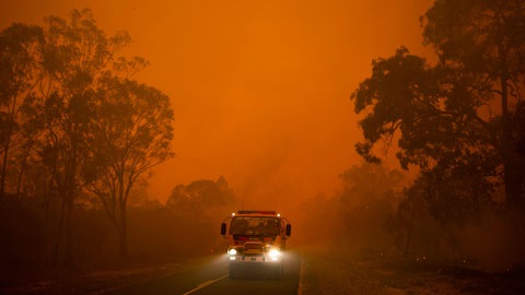 Bushfire smoke around a fire truck