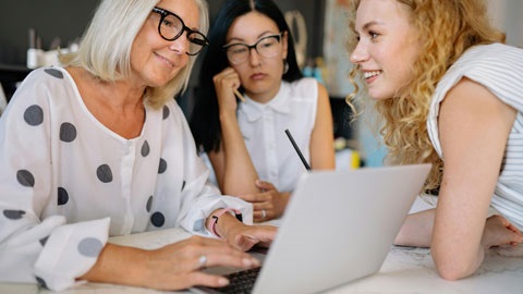 Person helping another person in meeting
