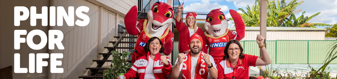 Phins for Life banner with City of Moreton Bay locals dressed in fan gear cheering on the team with mascots Phinny and Sandy.